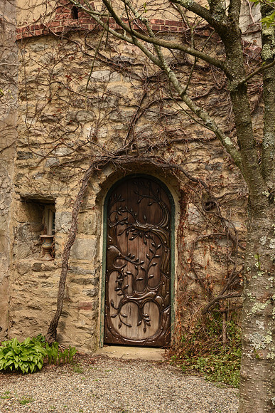 AndalusiaGardens.ArchedDoorinGardenwall._5238